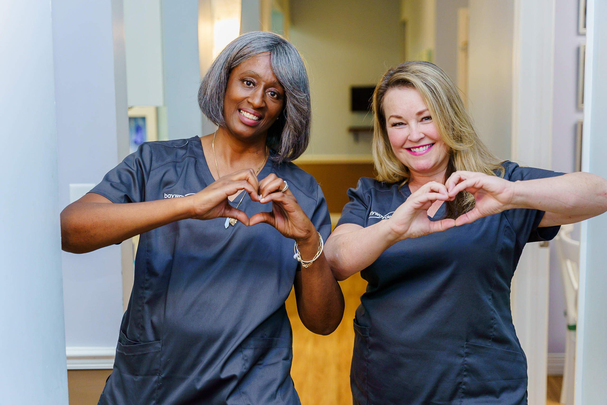 Dr. Sherberg with a happy dental implant patient Dental Assistants Warm Friendly